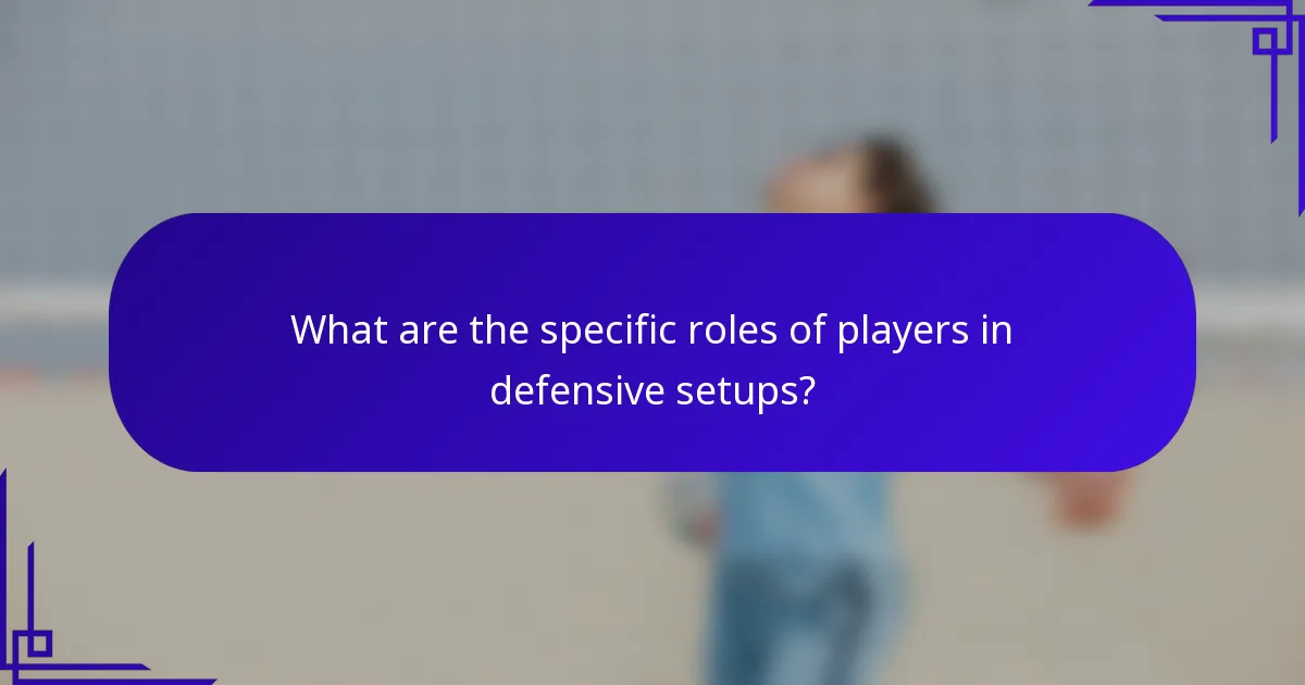 What are the specific roles of players in defensive setups?